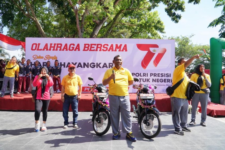 Dihadiri Pj Bupati, Gerak Jalan Santai dan Senam Berjalan Meriah di HUT Bhayangkara ke-77