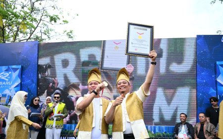 HUT Pekanbaru ke-242 Tahun Dihadiahi  Rekor MURI  Kue Talam Terpanjang Ukir Sejarah Baru Berkat Semangat KolaborAksi